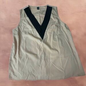 Sleeveless blouse deep v-neck